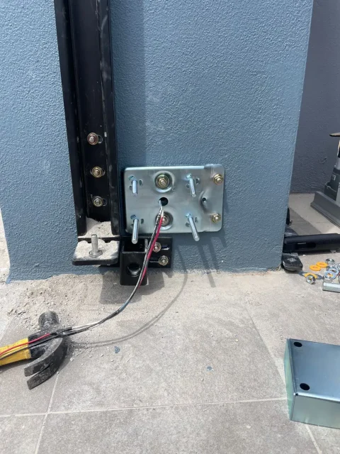 SmartGate installer at work on site, step 8 of 11